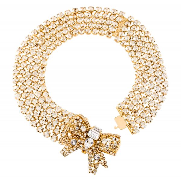 Gold crystal studded bow necklace