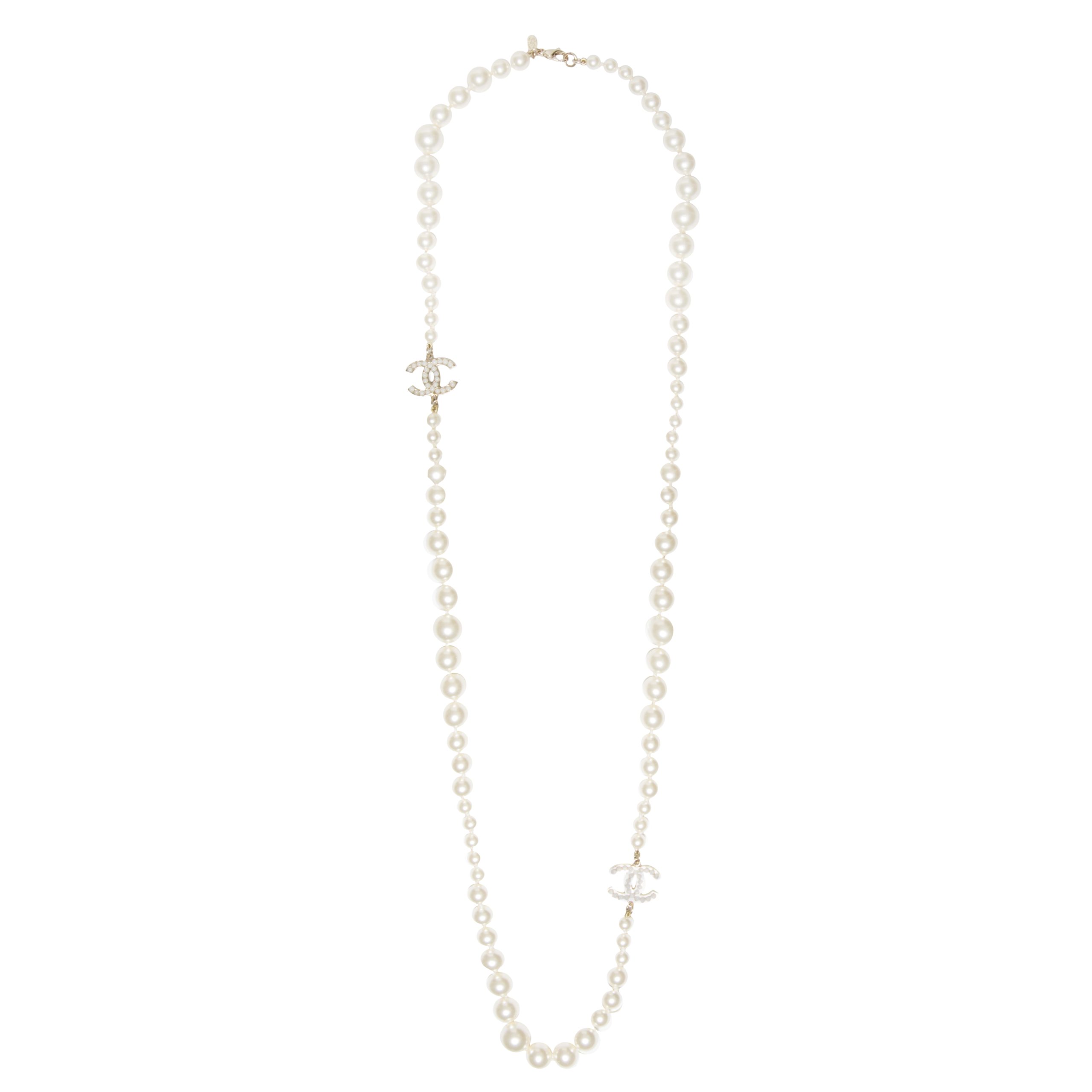 Long white pearl CC necklace